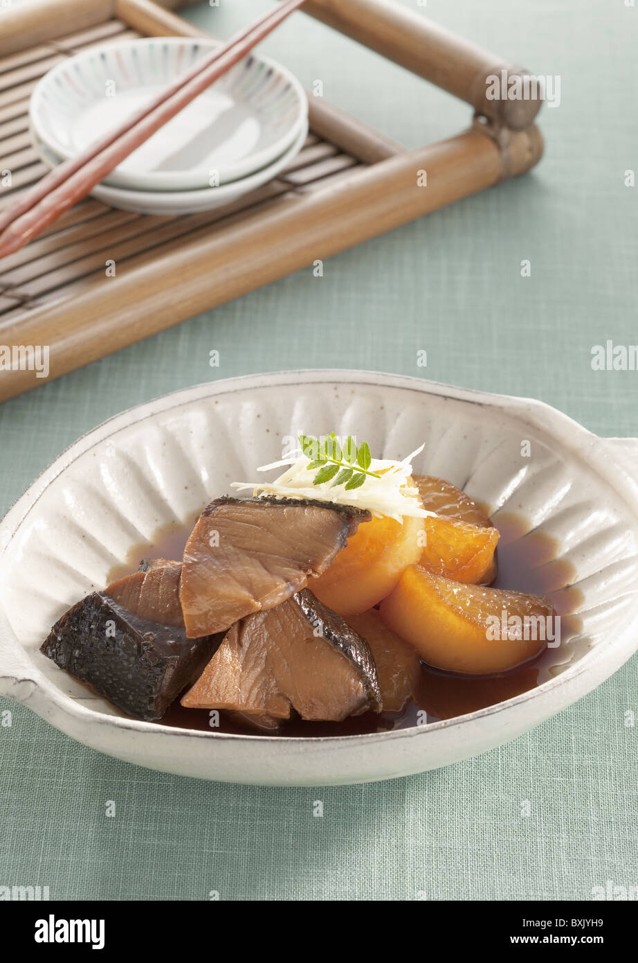 Yellowtail and Japanese radish simmered in soy sauce Stock Photo Alamy