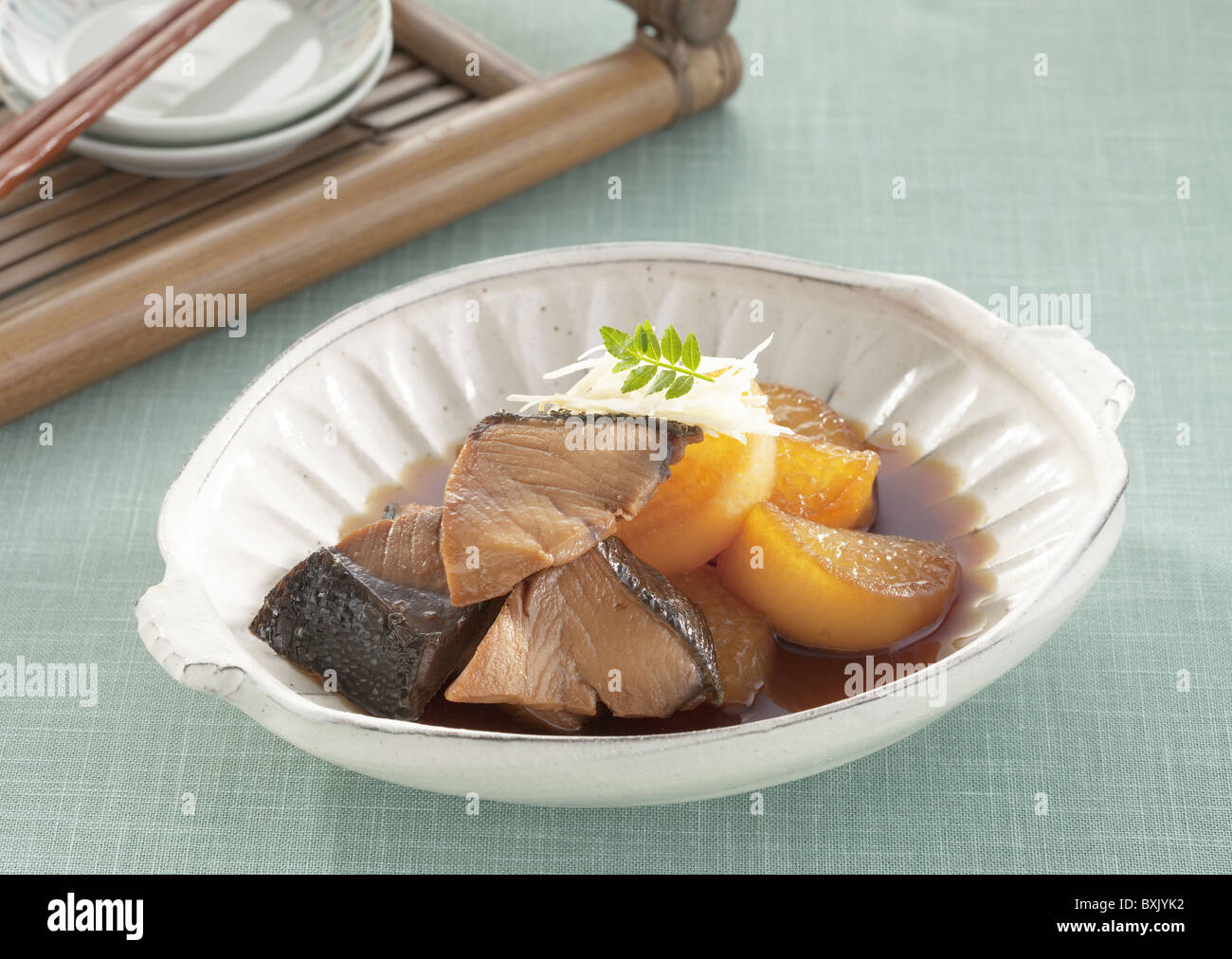 Yellowtail and Japanese radish simmered in soy sauce Stock Photo Alamy