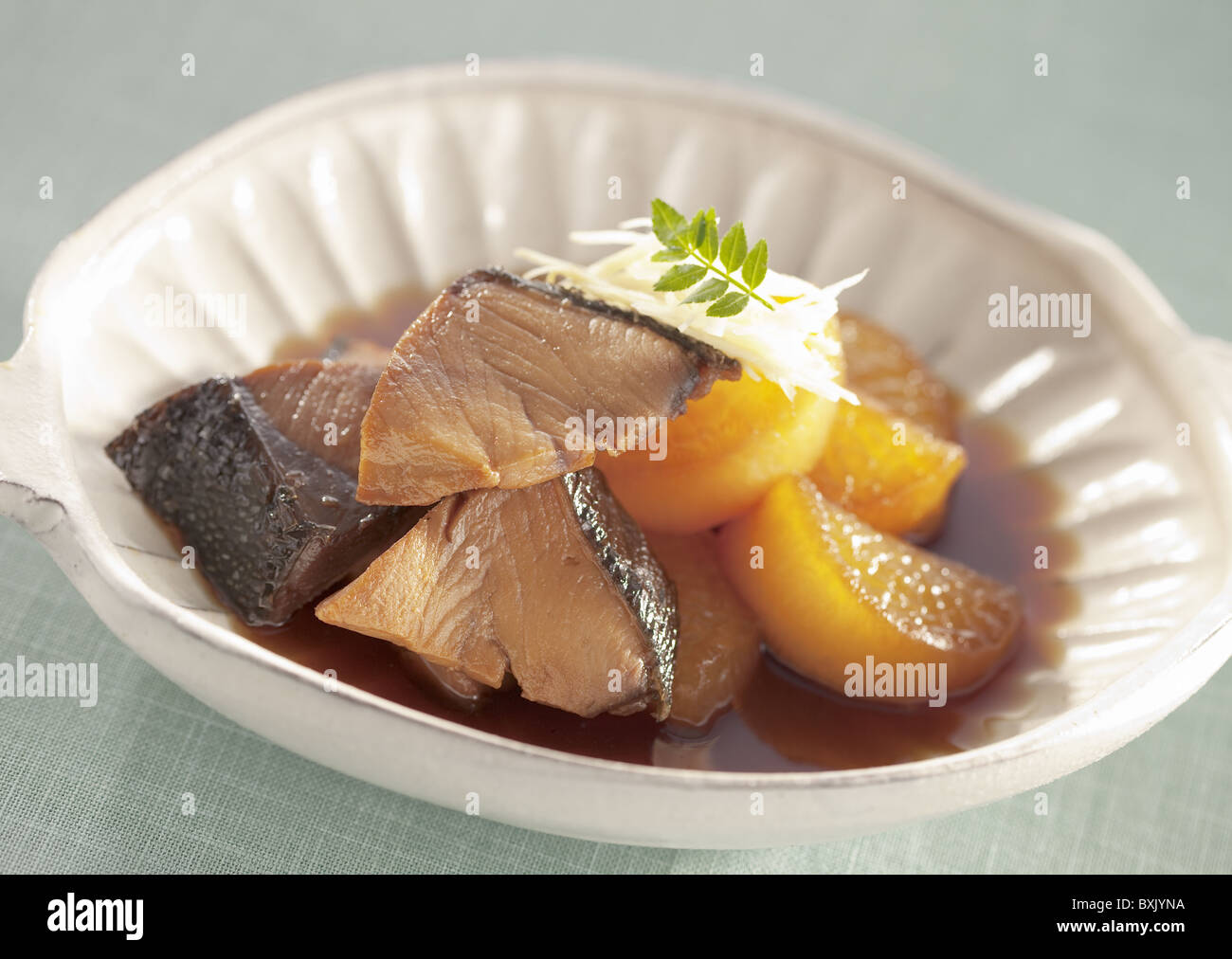 Yellowtail and Japanese radish simmered in soy sauce Stock Photo Alamy