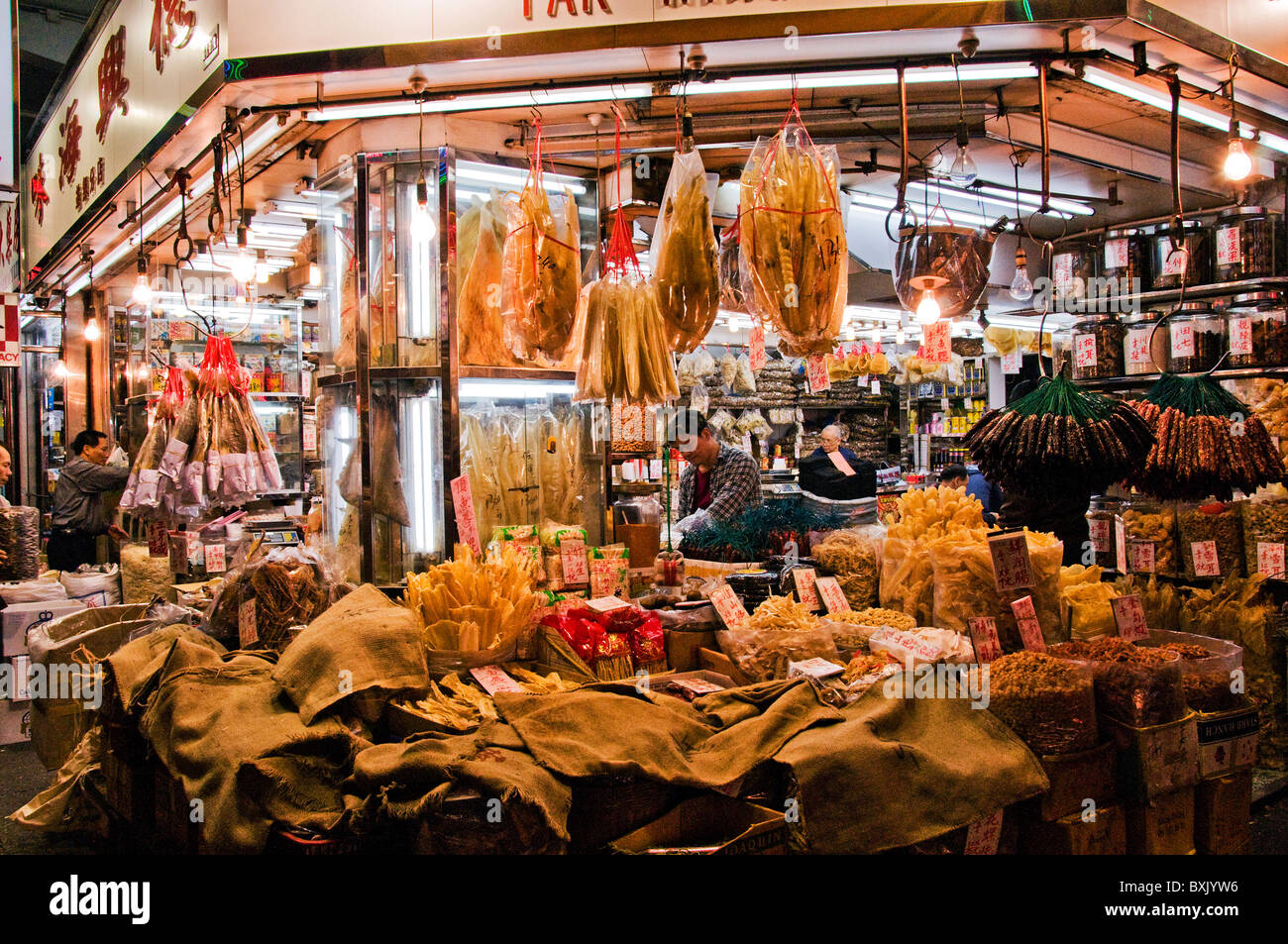 Open air outdoor market with goods and merchandise in downtown Hong