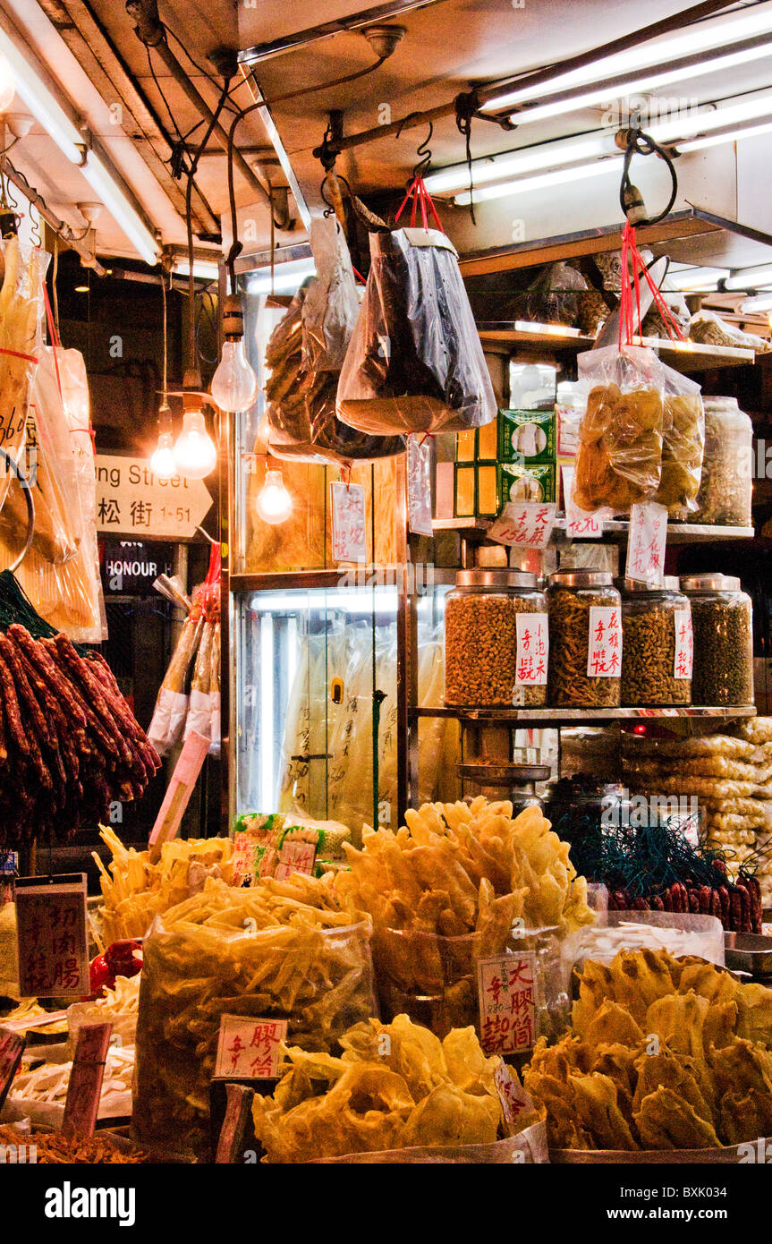 Open air outdoor market with goods and merchandise in downtown Hong