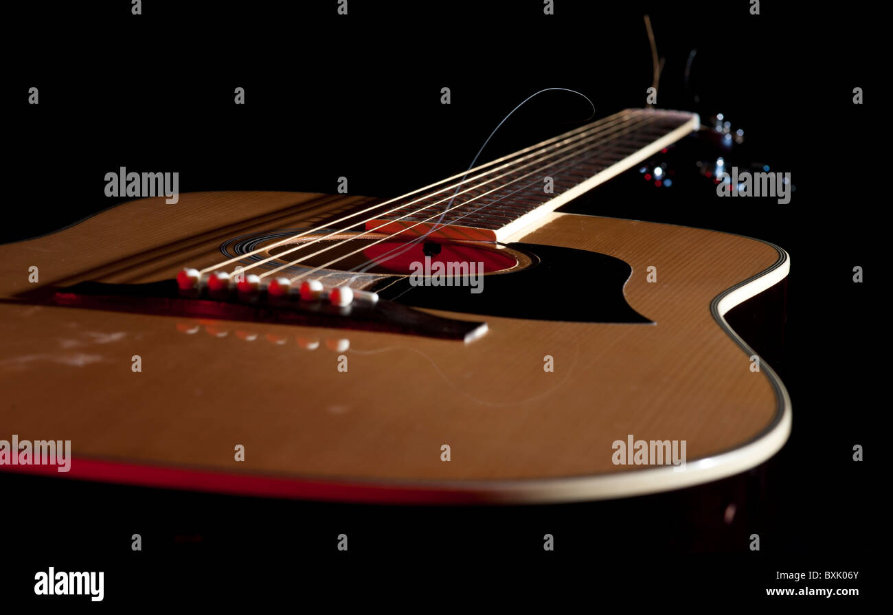 Guitar with broken string Stock Photo Alamy