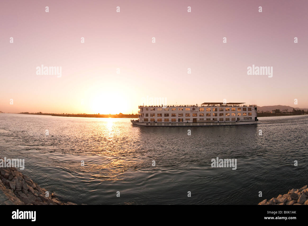 Egypt, Luxor. Nile cruise ship at sunset Stock Photo Alamy