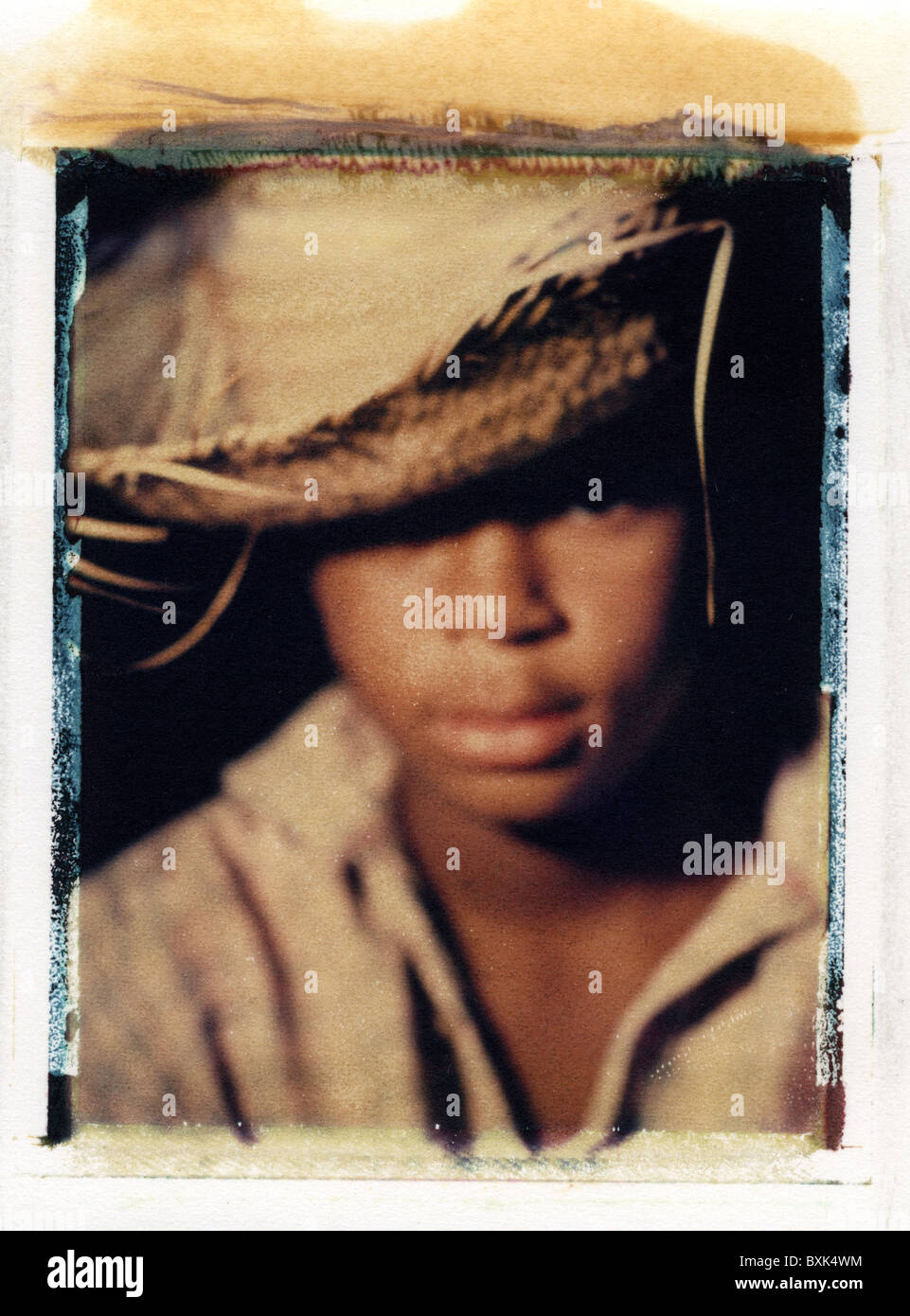 a huckleberry finn, young african boy 
