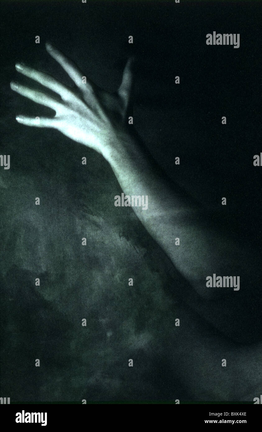 a man's hand and forearm, black and white, startling image Stock Photo