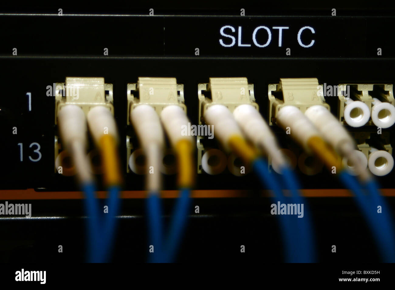 Fibre optic connections on an Internet fibre router. Stock Photo