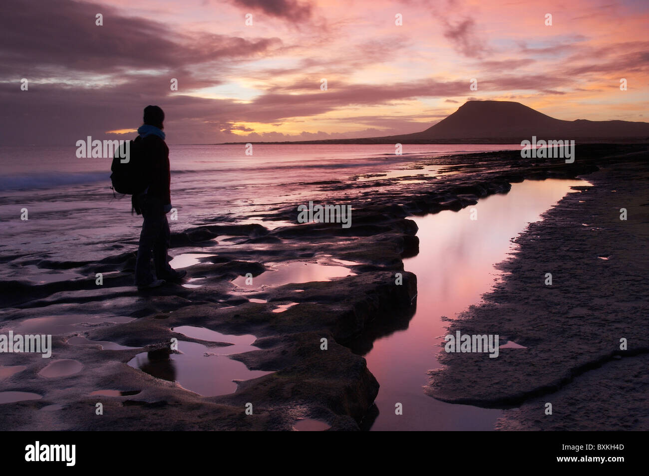 La Graciosa Island, Female Hiker At Sunset Stock Photo