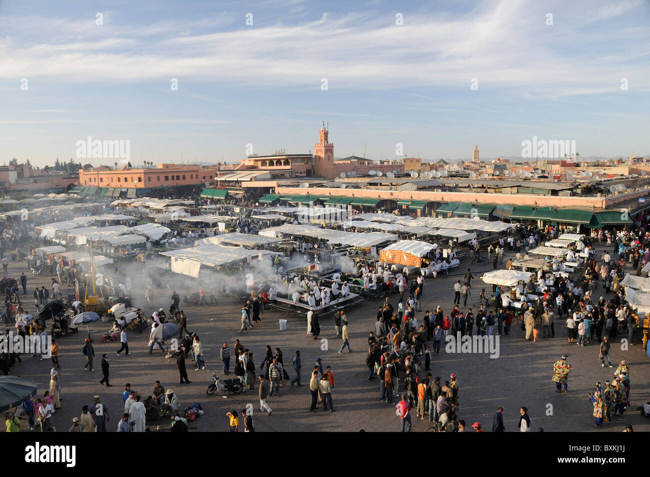 General overview of busy Djemaa el-Fna meeting place with food-stalls  Viewed from the Cafe Glacier roof terrace Stock Photo