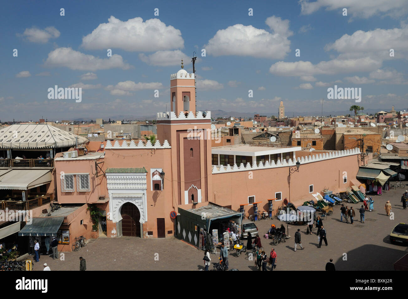 Djemaa el-Fna street with mosque  Viewed from the Cafe Glacier roof terrace Stock Photo