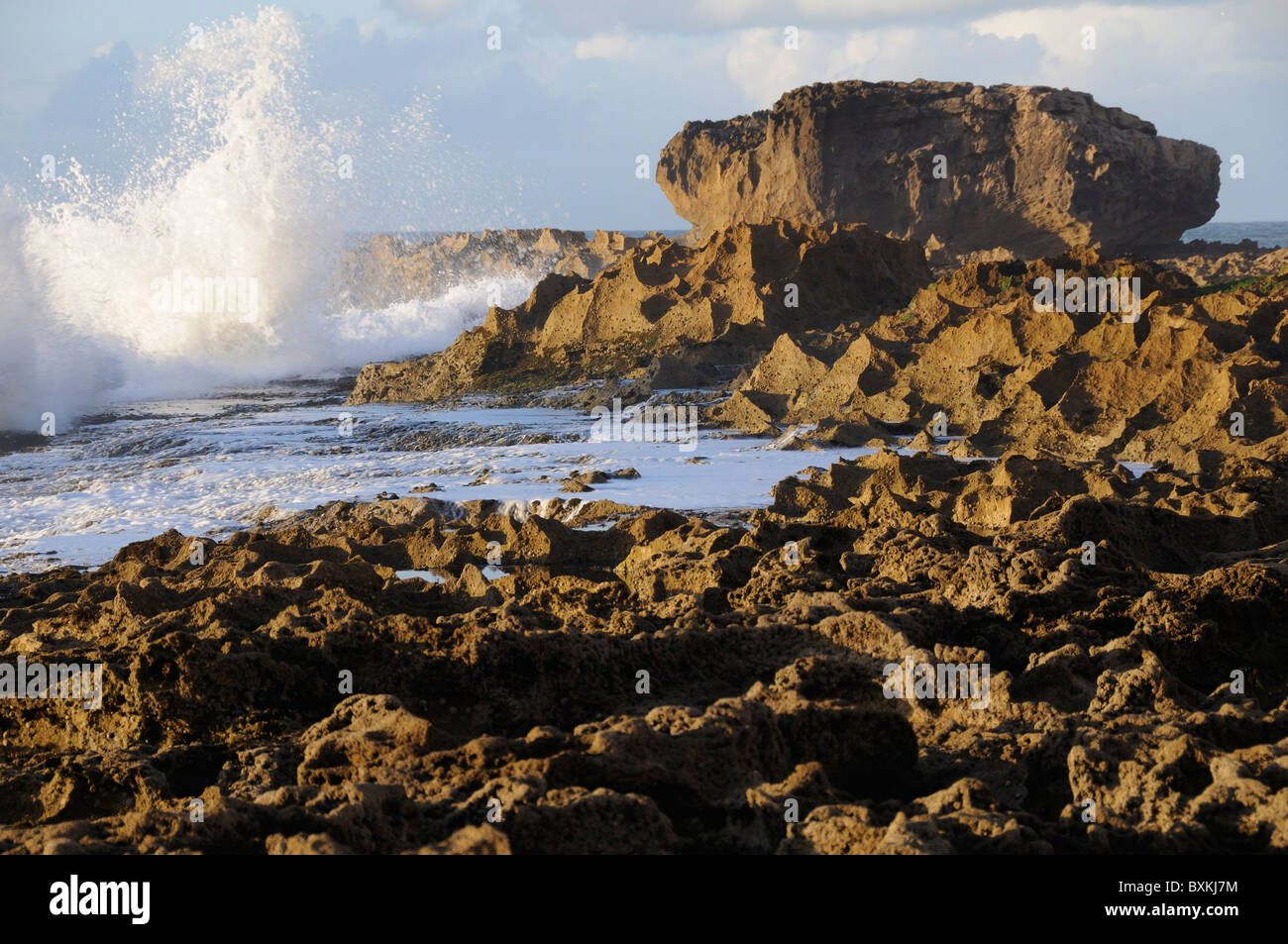 Crashing waves & rockpools Stock Photo