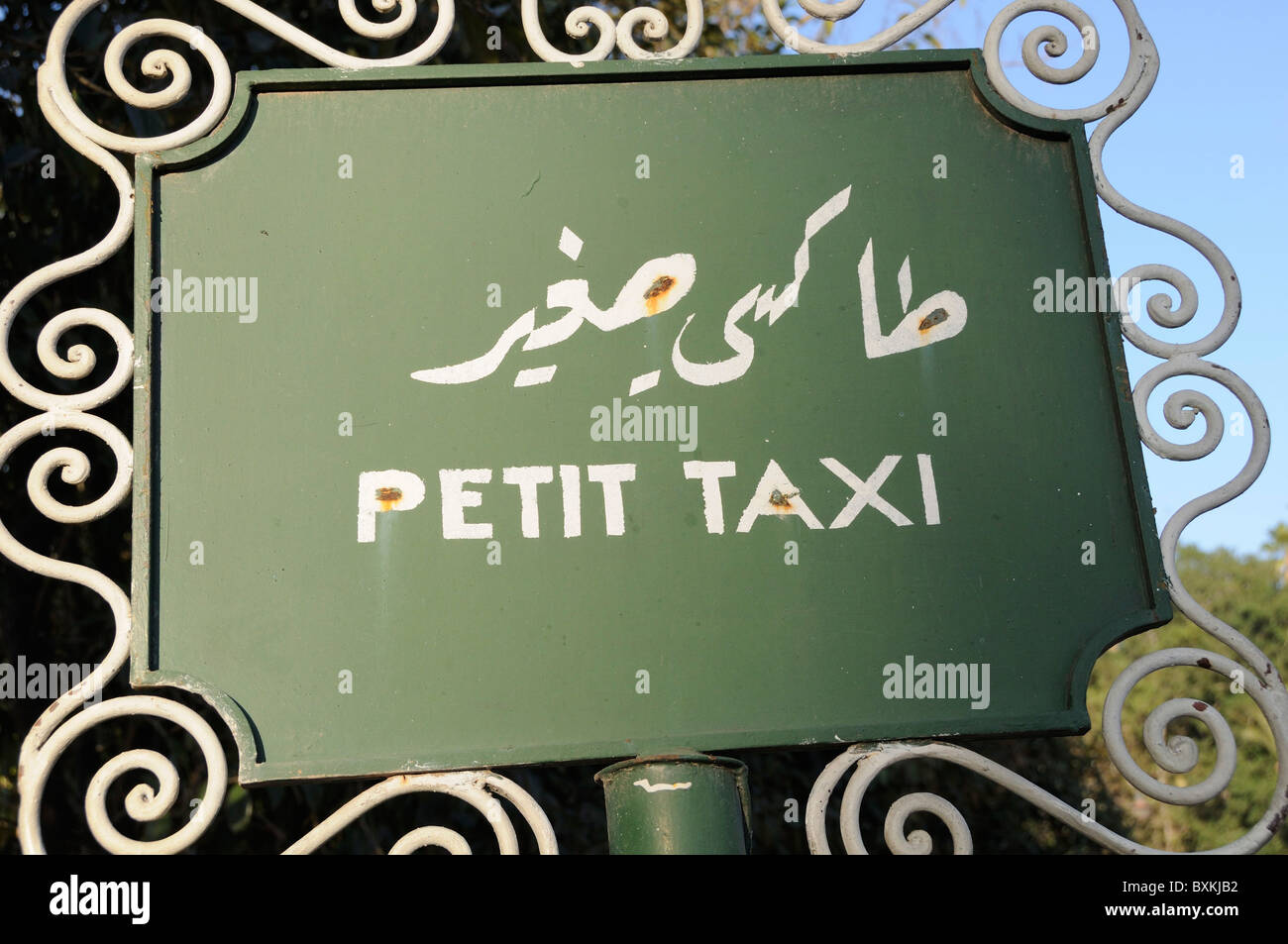 Detail of a Petit taxi sign inMarrakech Stock Photo