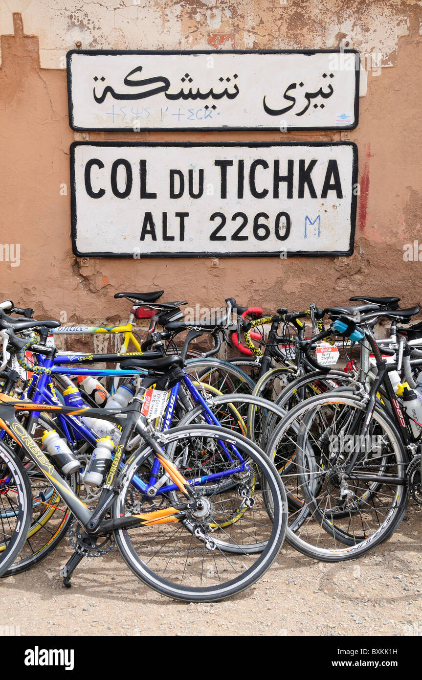 Bicycles at summit with sign, Tiz-n-Tichka Stock Photo