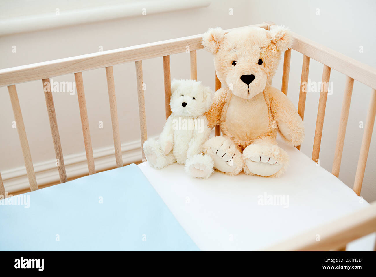 teddy bear in bed
