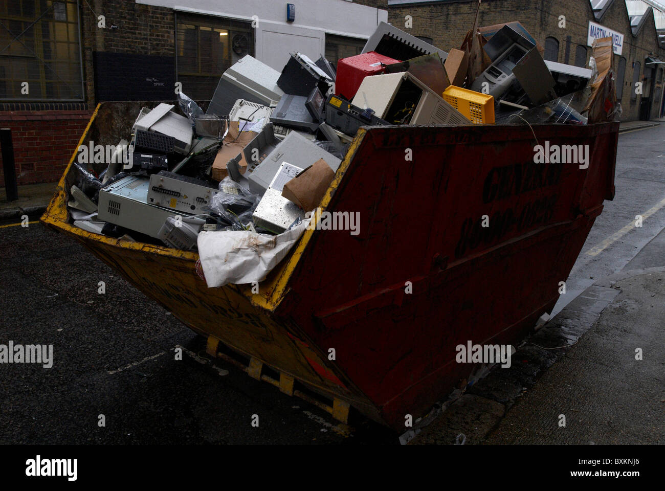 Office equipment in a skip South London UK Stock Photo - Alamy