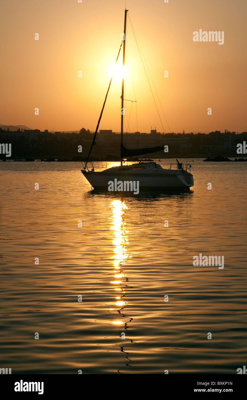 Yacht in harbour at sunrise Stock Photo - Alamy