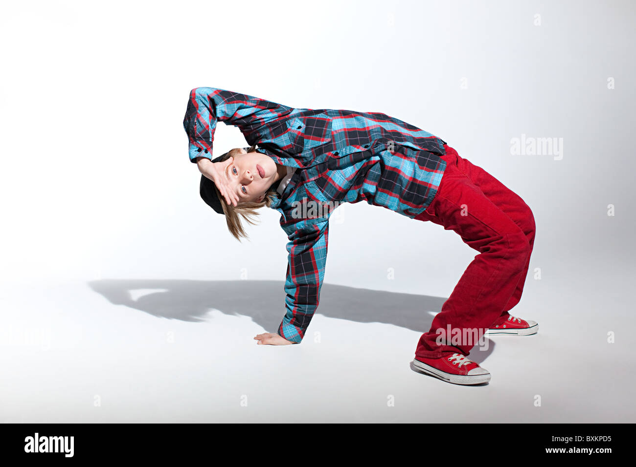 Backwards Boy Teenage boy bending backwards Stock Photo - Alamy