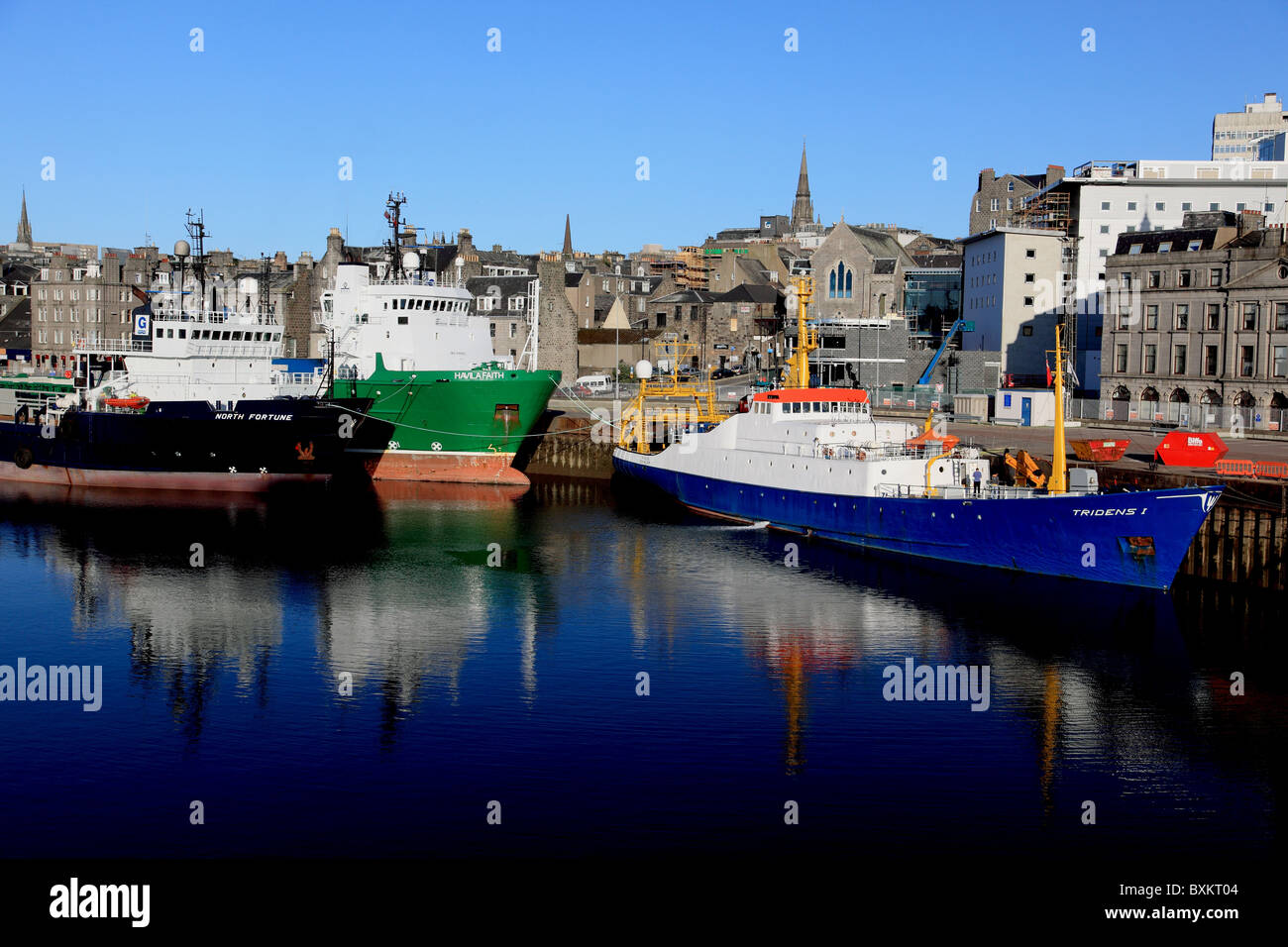North Fortune and Havila Faith, both cargo supply ships and Tridens 1, a dredger in Aberdeen Harbour by Regent Quay Stock Photo