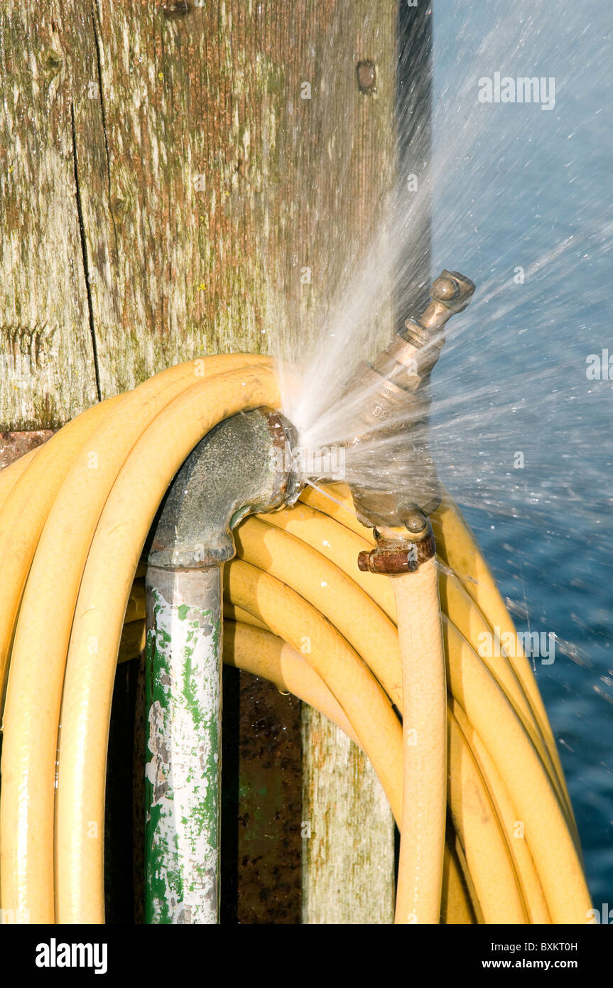 Burst water pipe Stock Photo Alamy