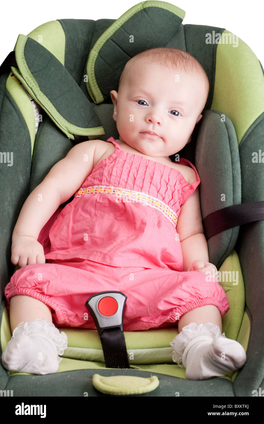 Baby girl toddler in a car seat Stock Photo Alamy