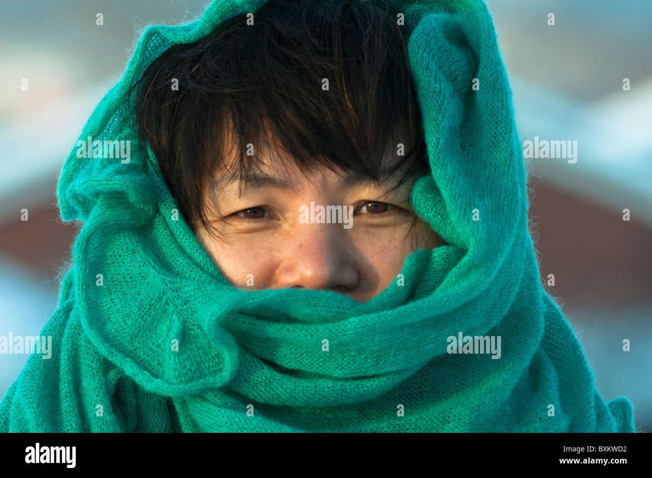 Korean woman wrapped up to stay warm in the winter. Stock Photo