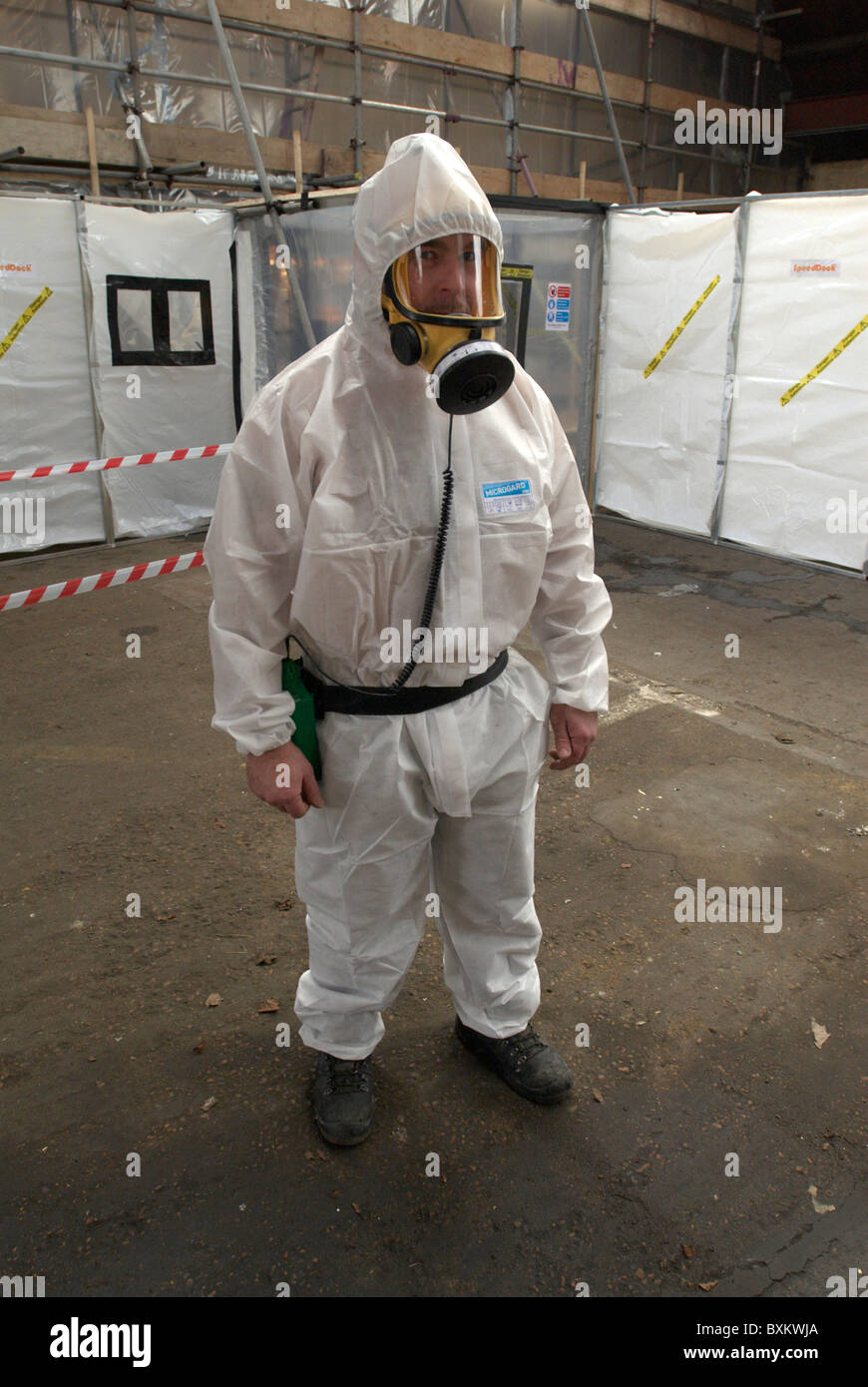Asbestos Removal. Man in full protective clothing United Kingdom Stock