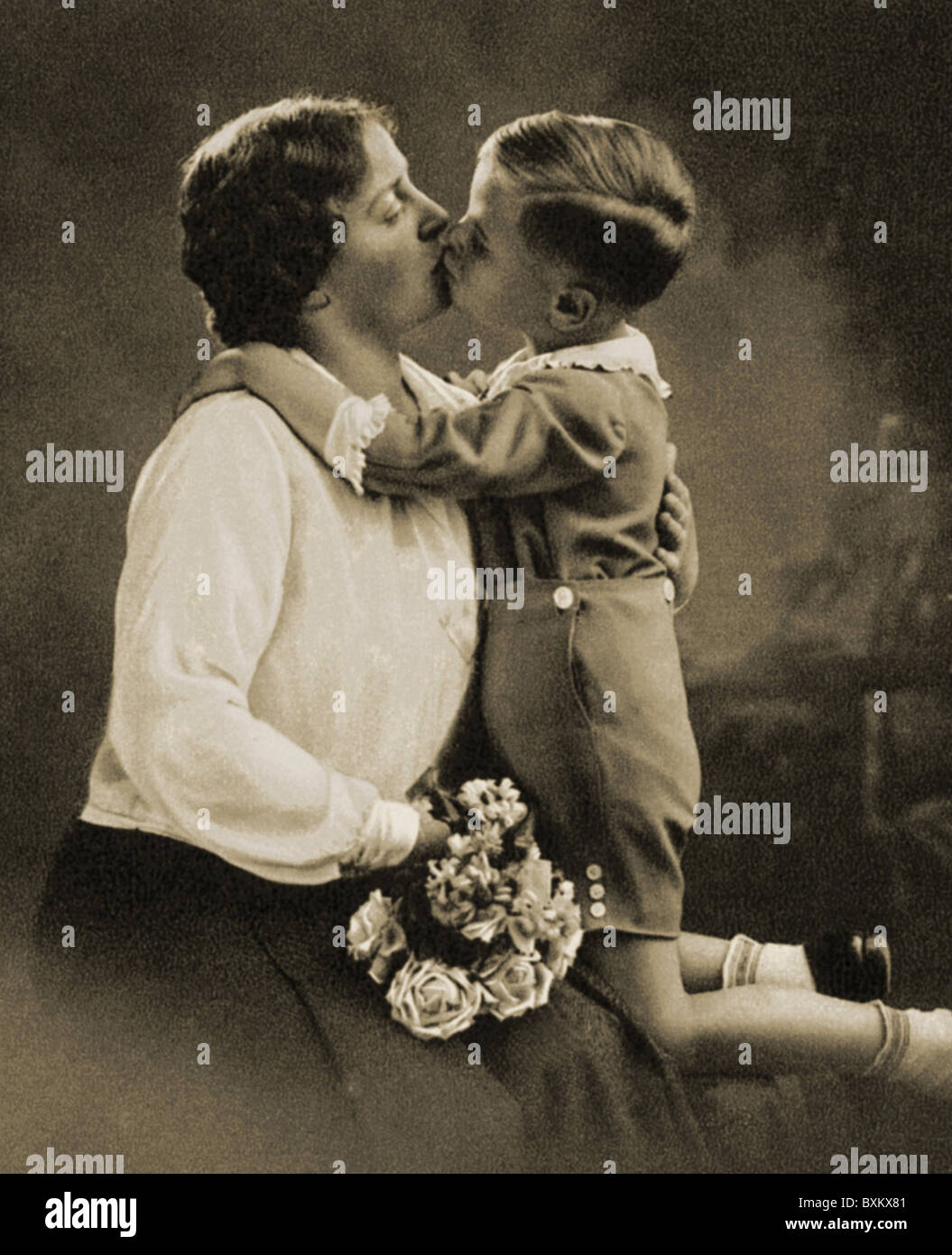 People Woman With Child Boy Is Kissing His Mother On Mother S Day Stock Photo Alamy