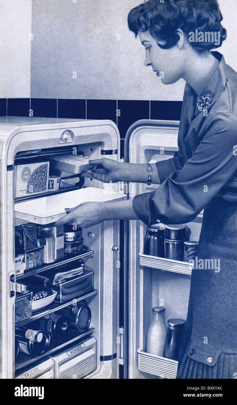 household, kitchen and kitchenware, Bosch refrigerator, woman opens fridge, Germany, 1956, Additional-Rights-Clearences-Not Available Stock Photo