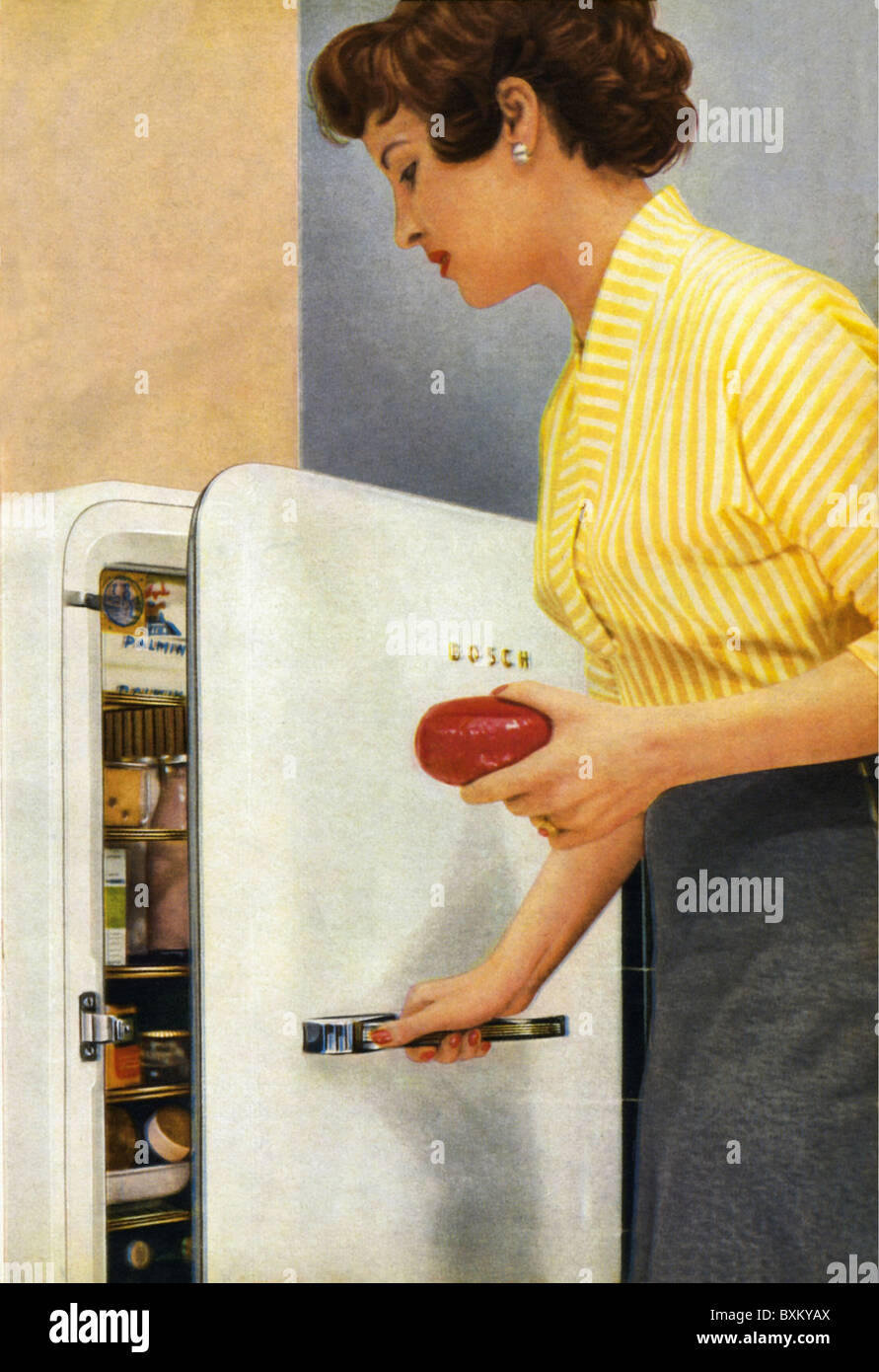 household, kitchen and kitchenware, Bosch refrigerator, woman opens fridge, Germany, 1956, Additional-Rights-Clearences-Not Available Stock Photo