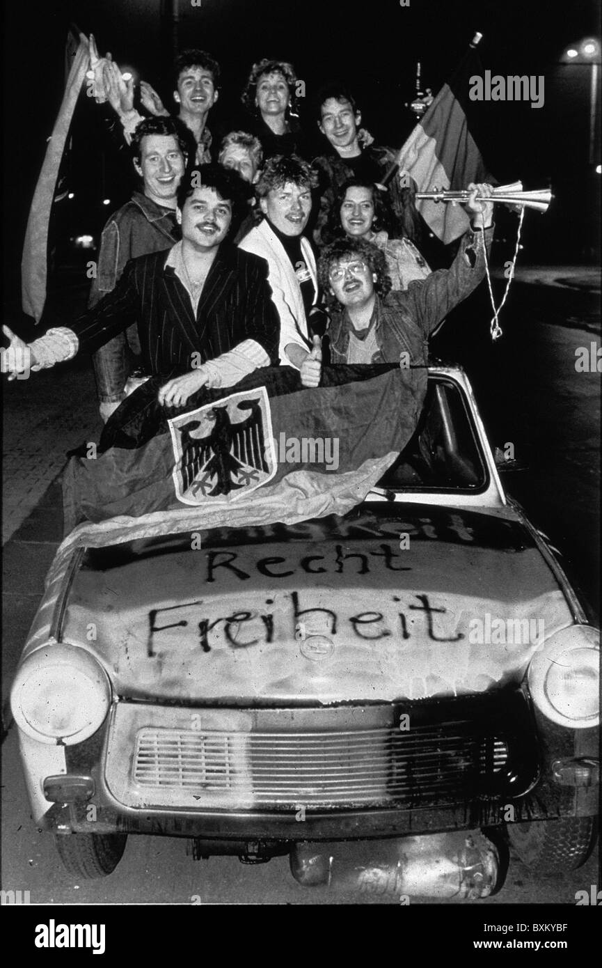 geography / travel, Germany, Fall of the Berlin Wall, GDR citizen in Trabant car celebrating the German reunification, 3.10.1990, Additional-Rights-Clearences-Not Available Stock Photo