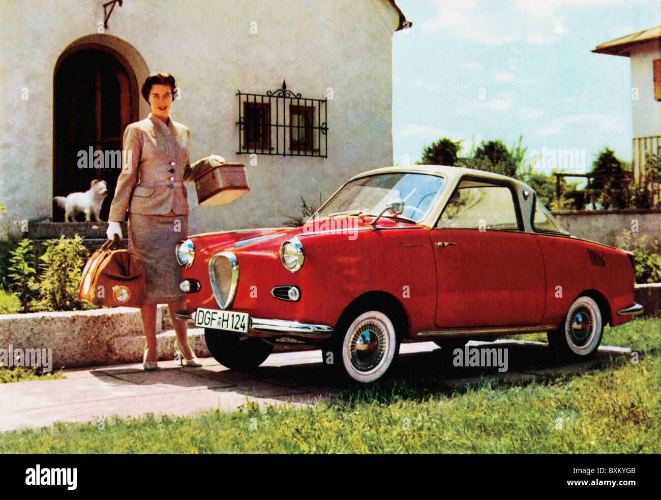 transport / transportation, car, vehicle variants, Goggomobil Coupe TS 400, female car owner outside of his house, made by Hand Glas GmbH, Dingolfing, Bavaria, Germany, 1956, 1950s, 50s, 20th century, historic, historical, car, cars, small car, German, red, four-seater, four-seaters, bicolored varnish, two-cylinder engine, two-cylinder engines, economic miracle, economic miracles, Made in Germany, prosperity, people, women, woman, Additional-Rights-Clearences-Not Available Stock Photo