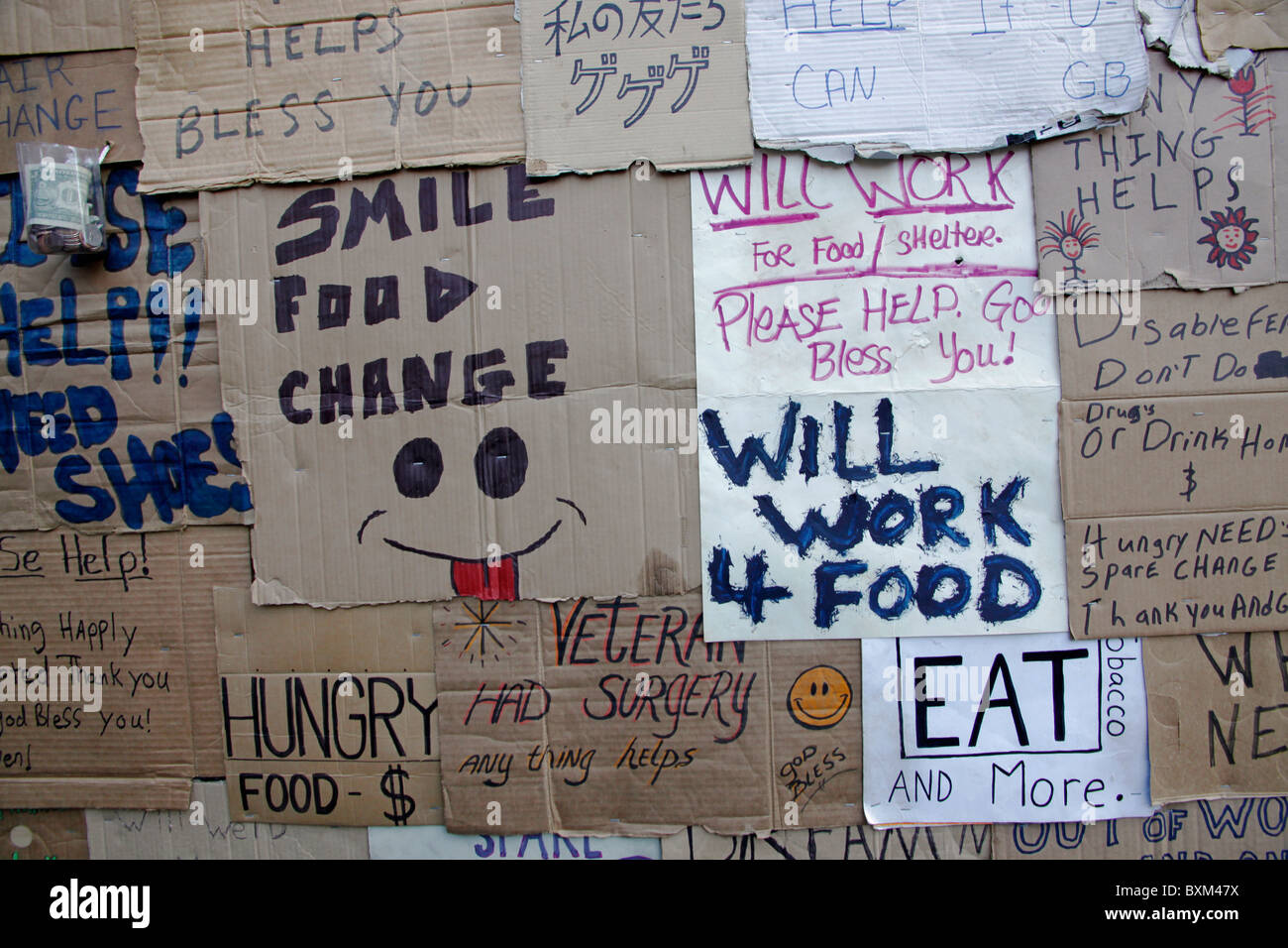Signs by homeless and unemployed people. Stock Photo
