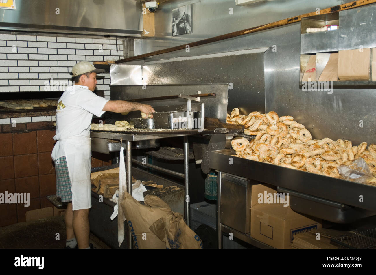 Making bagels bakery and shop, Montreal, Canada. Stock Photo