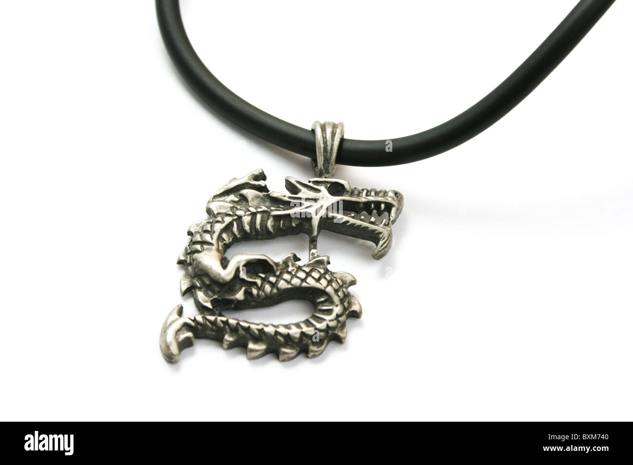 Necklace with dragon medallion. Stock Photo