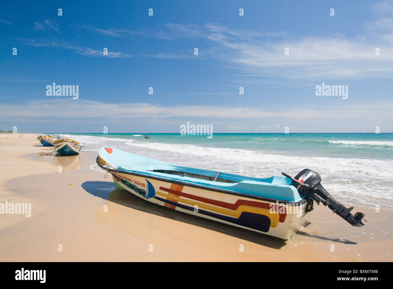 Small boats available for hire at Nilaveli Beach, Trincomalee, Sri Lanka East Coast. Stock Photo