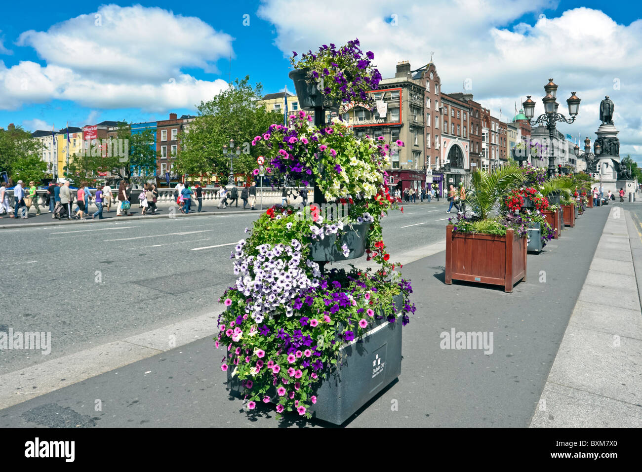 View towards O'Connell Street from O'Connell Bridge spanning River Liffey in Dublin Ireland Stock Photo