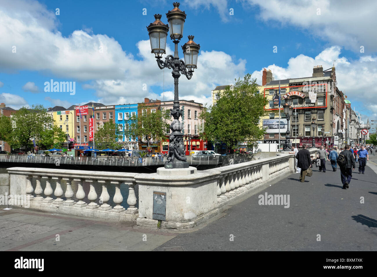 Cast Iron lamp stand on O'Connell Bridge spanning River Liffey in