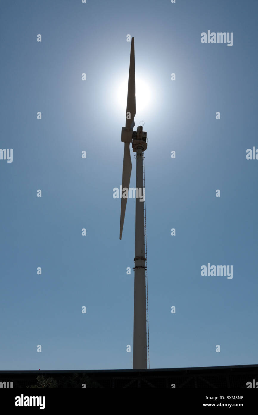 Wind turbine against the sun at the Parque Eolico in Tenerife Canary Islands Spain Europe Stock Photo