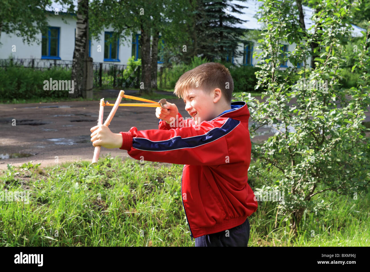 boy with slingshot Stock Photo