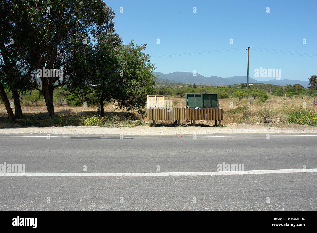 Trash cans at the road, manufactured in wood, I walk to tourist places at Viña del Mar region of Chile. Stock Photo