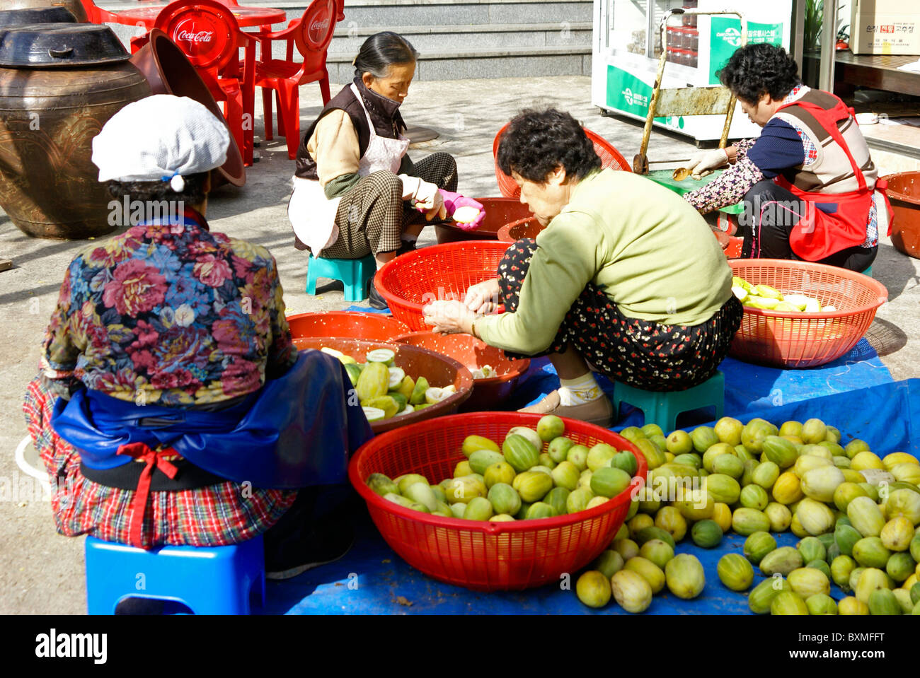 Women cleaning Korean melons, Sunchang Traditional Gochujang Village, South Korea Stock Photo