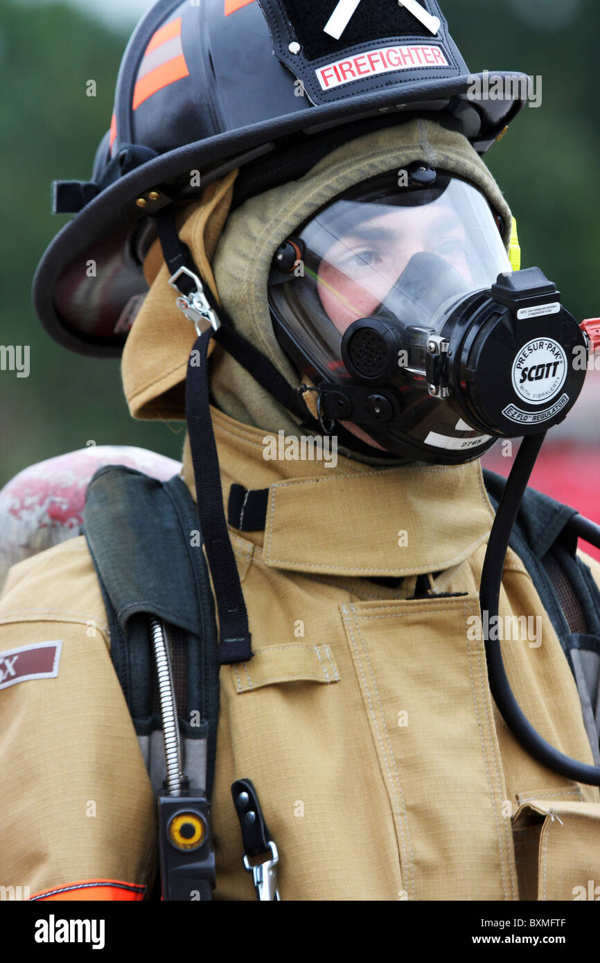 A firefighter in full firefighting gear Stock Photo Alamy