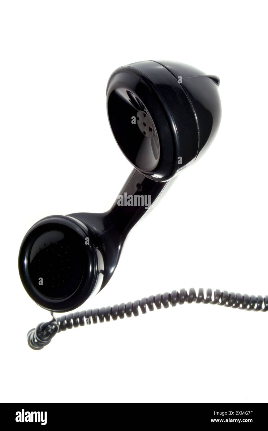 Retro black phone receiver with cord on white background Stock Photo