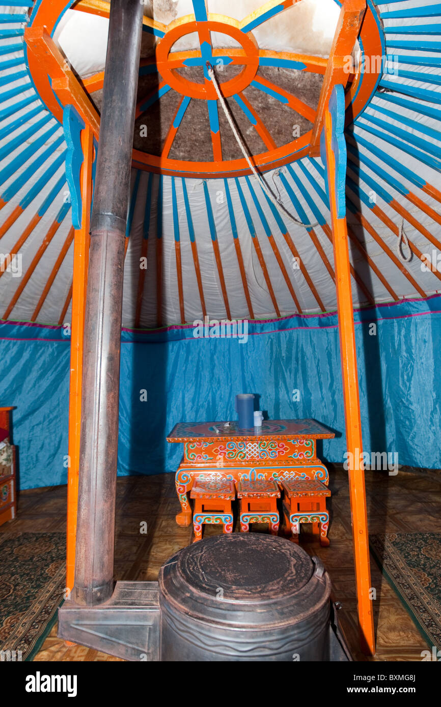 Interior to Yurt, heater, table, chairs, Khongo Khan Uul Nature Reserve,  Mongolia Stock Photo - Alamy
