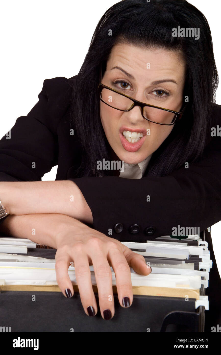 Female hanging over file looking exhausted Stock Photo - Alamy