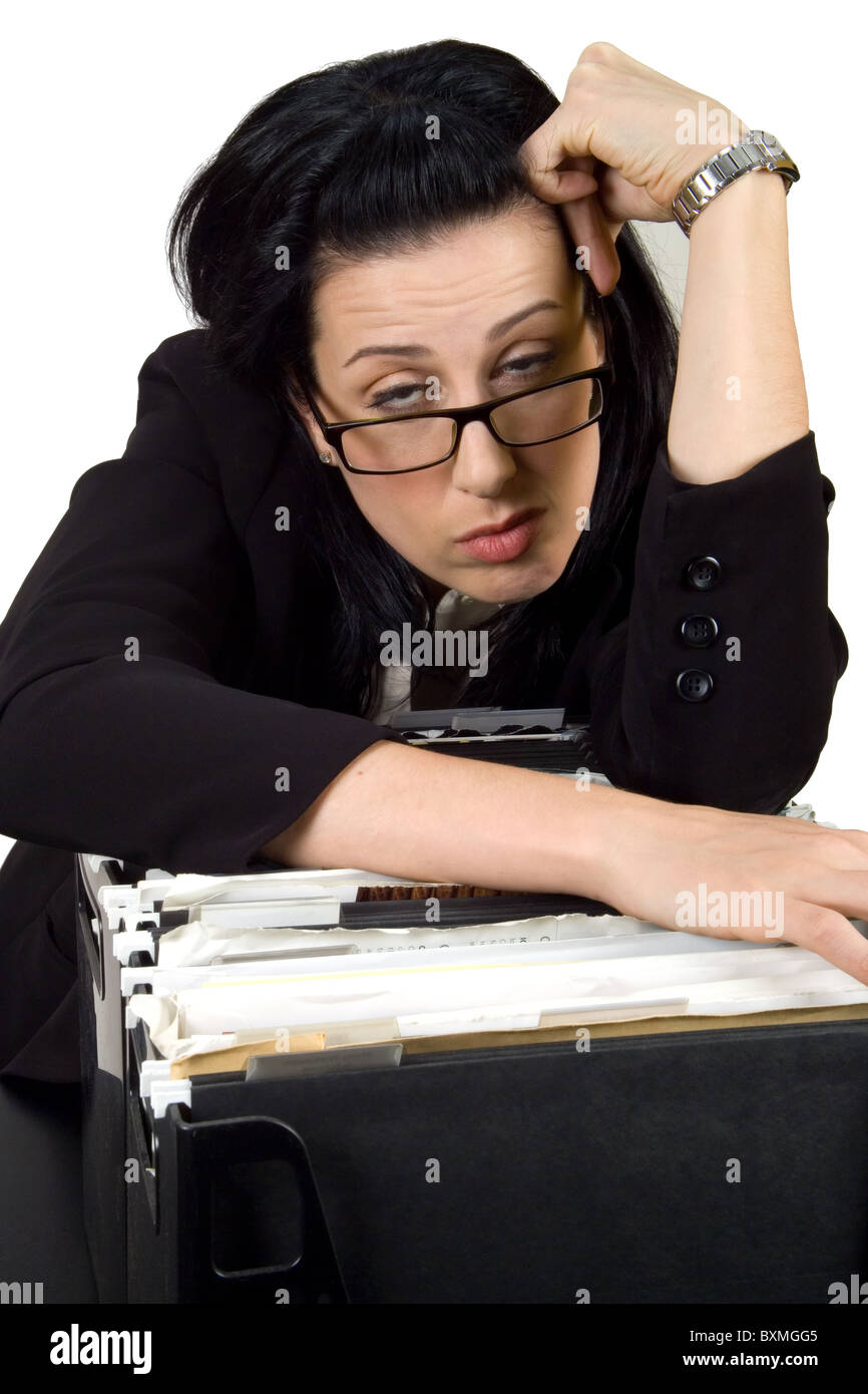 Female hanging over file crate looking sleepy Stock Photo - Alamy