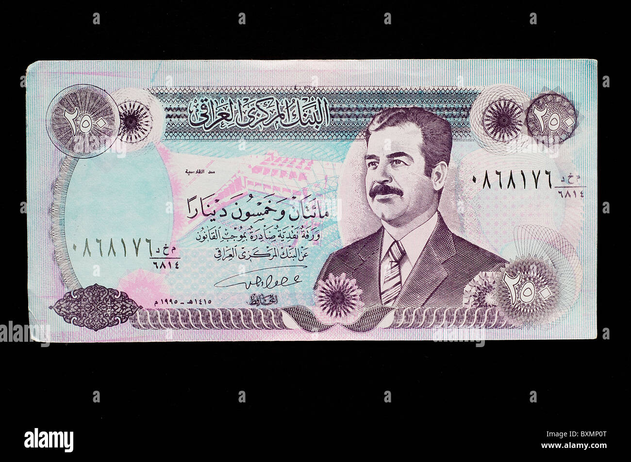 old Iraqi banknote with Saddam Hussein effigy Stock Photo