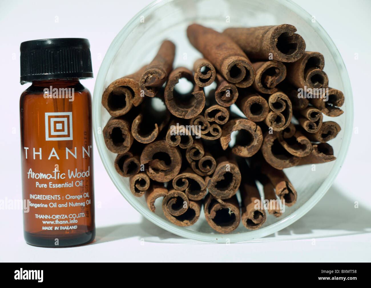 Aromatic oil on the cinnamon wood sticks give the power of energy and enjoy scents Stock Photo