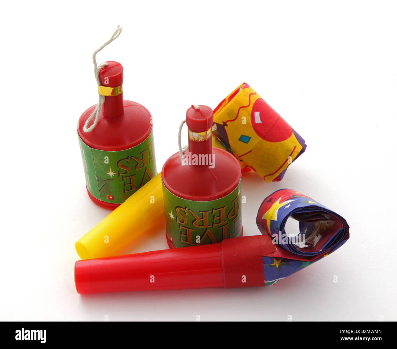 Party blowers and poppers on a plain white background Stock Photo - Alamy