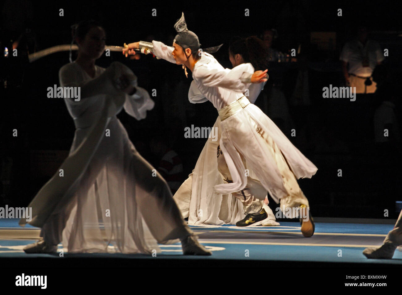 Dancers performing at interval of women's fencing finals, Olympic Games, Beijing Stock Photo