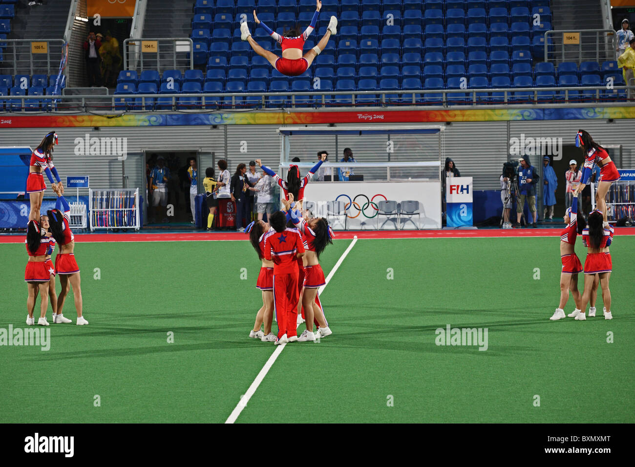 Chinese cheerleaders perform before Ladies Field Hockey match at Olympic Games, Beijing, China